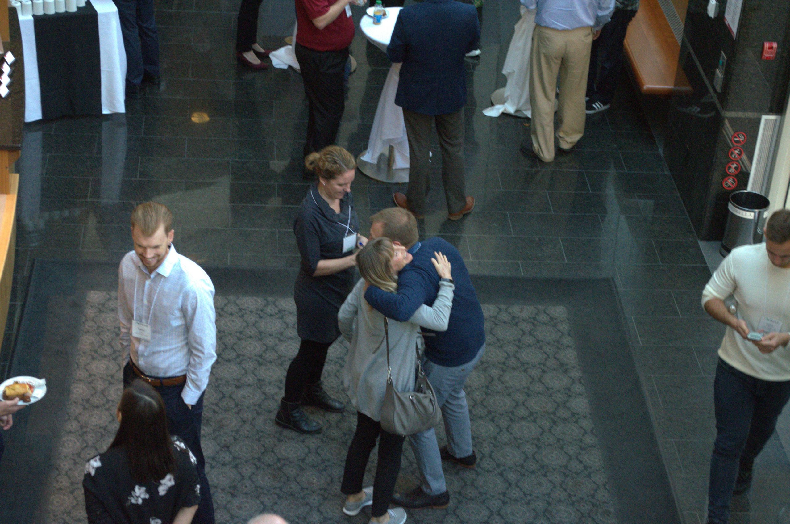 Consortium members share a hug at the 2018 Elentra Engage Conference in Vancouver.